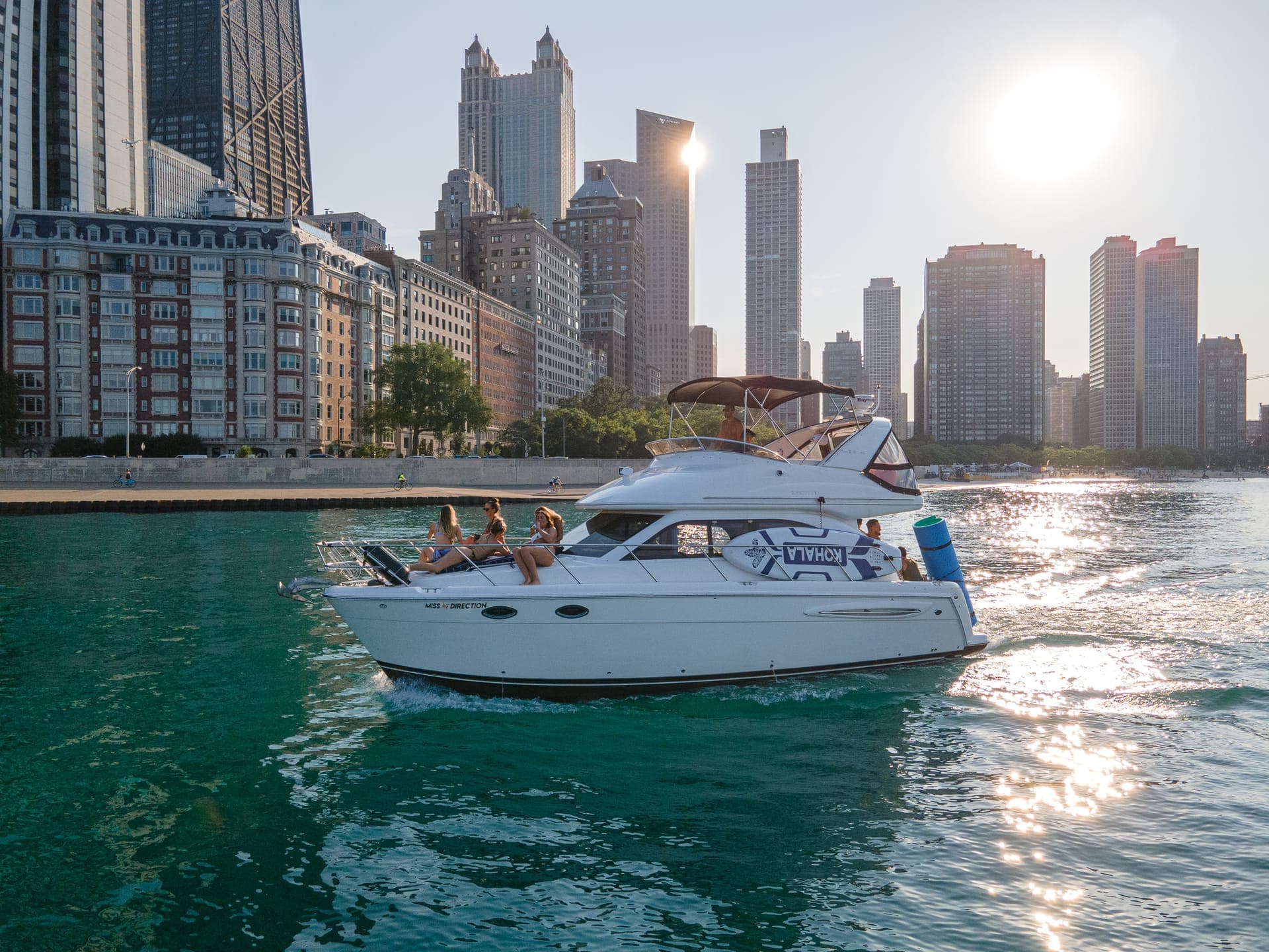 Island 41-foot Meridian yacht cruising Lake Michigan with Chicago skyline in background